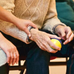 Person holding a stress ball